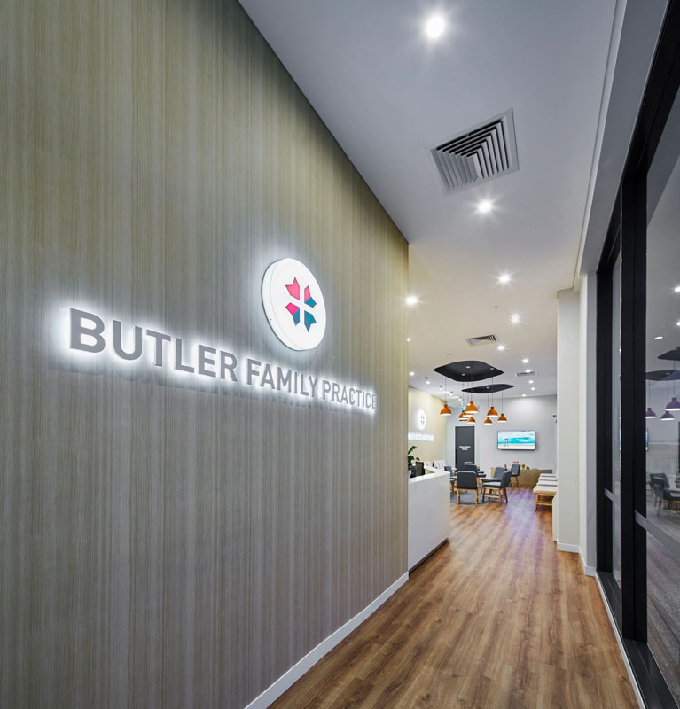 butler family practice interior with logo on wall